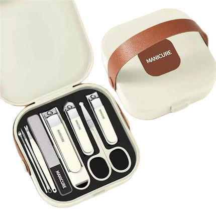 Manicure set - Pedicure set - Nail clippers - Nail scissors - Nail file - Tweezers - Stainless steel - Luxury case - Travel size - Nail cutting - Cuticle pusher - Nail styling - Hands and feet - Compact - Beige - 7 pieces.