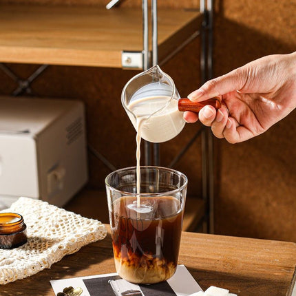 Espresso Measuring Cup - Shot Glass - Milk Jug - Coffee Accessories - Barista Tools - Measuring Cup Glass - Espresso Glasses - Sauce Jug - Measuring Glass - Mini Measuring Cup - Double Spout - Heat Resistant - Wooden Handle - Transparent - 2 Pieces.