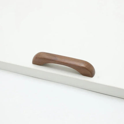Furniture handles - Kitchen handles - Door handles - Cabinet handles - Drawer knobs - Furniture fittings - Kitchen fittings - Handles - Walnut - Wood - Wooden - Kitchen renovation - Modern - Black walnut - Bridge shape - Pitch 96mm - Walnut - Set of 4.