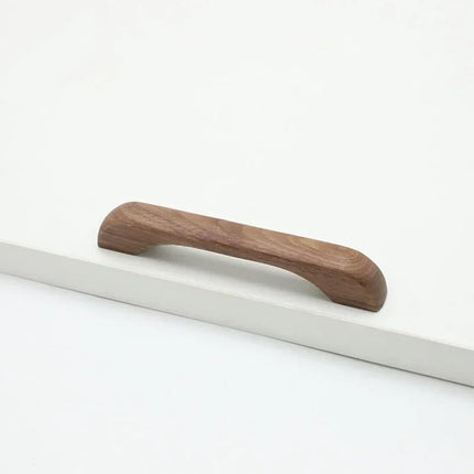 Furniture handles - Kitchen handles - Door handles - Cabinet handles - Drawer knobs - Furniture fittings - Kitchen fittings - Handles - Walnut - Wood - Wooden - Kitchen renovation - Modern - Black walnut - Bridge shape - Pitch 128mm - Walnut - Set of 4.