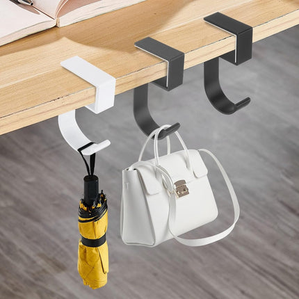 4 pieces - Hooks - Desk hooks - Backpack hooks - Storage accessories - No drilling required - Suitable for desks, bedrooms, study rooms, and living rooms - White - 4.8*2*10 cm.