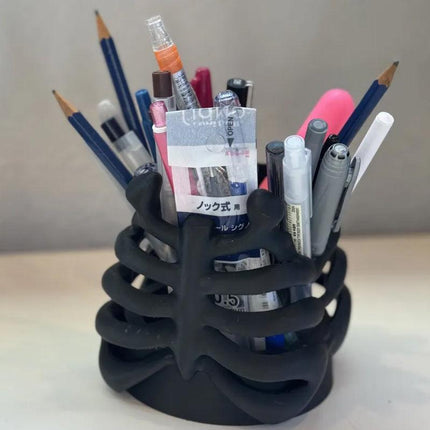 3D Printed Rib Pen Holder - Skeleton Desktop Organizer is both a practical pen holder and a sculpture..