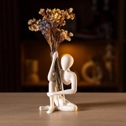 This "Blooming" vase stand adds a touch of nature to your space. White, single piece..
