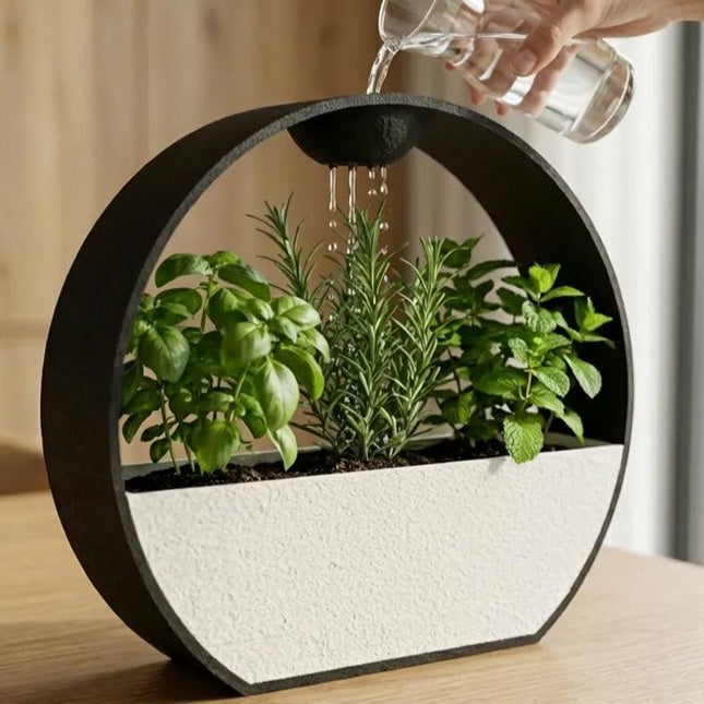 3D-printed stone-textured self-watering flower pot.