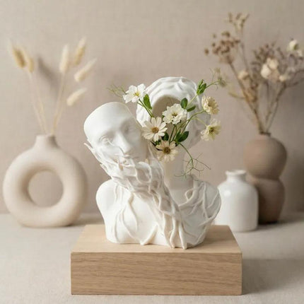 A 3D-printed vase shaped like a goddess of nature. Let go of pretense. Stay in nature..