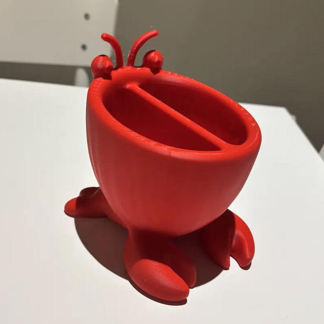 3D-printed crab-shaped toiletries storage box, red..