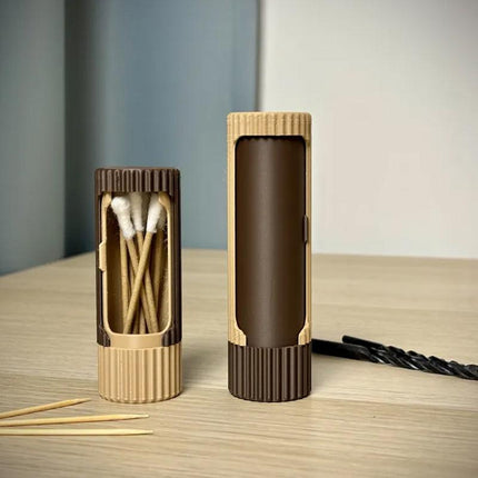 Compact 3D-printed rotating organizer capsule, 1.3 inches long x 4.1 inches high..
