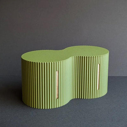 3D-printed toilet paper roll storage box, light green.