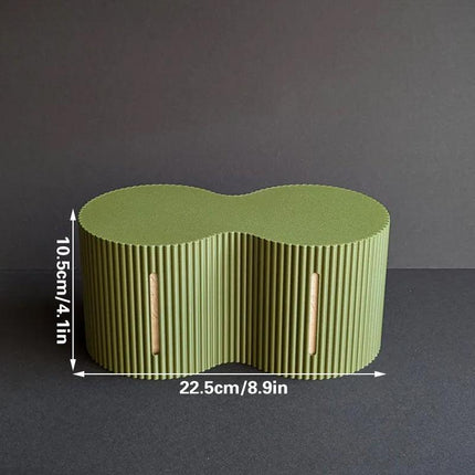 3D-printed toilet paper roll storage box, light green.