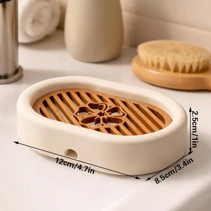 3D-printed oval soap dish with drain rack, white and wood-look..