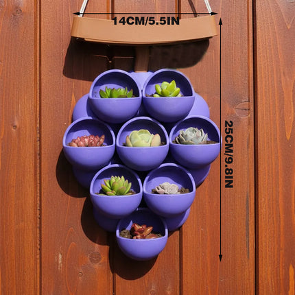 3D-printed grape pots in purple, brown, and green..