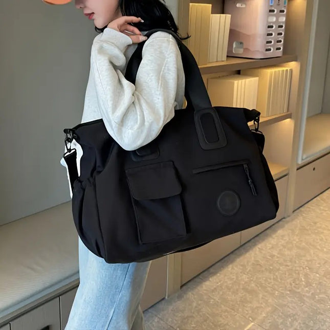 black Large-capacity travel tote bag, lightweight carry-on luggage with shoulder strap, gym bag, portable laptop bag, ideal for short trips, hand-carry style..