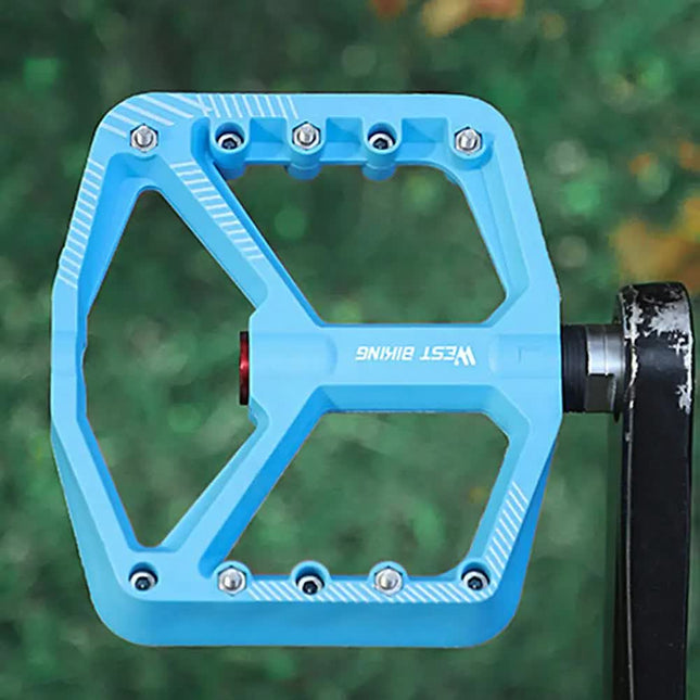 pair of wide pedals with non-slip surface and repair function, blue.