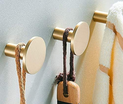 Set of 4 wall hooks in brushed brass, towel hooks in gold.