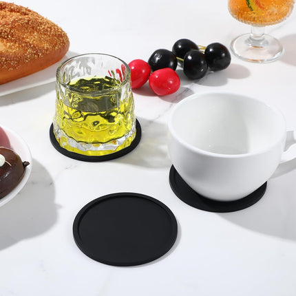 Xindojuz Drink Coasters Set of 4, 3.94 Inch Black Silicone Coasters for Drinks Washable Heat Resistant Durable Non-Slip Round Cup Mats for Coffee Table Wooden Desk Kitchen Bar, Black.