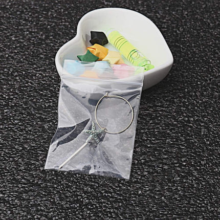 100 PCS Small Plastic Bags, 2" x 2.76" Resealable Zipper Poly Bags Mini Plastic Bags Clear Small Jewelry Bags for Jewelry, Screws, Storage.