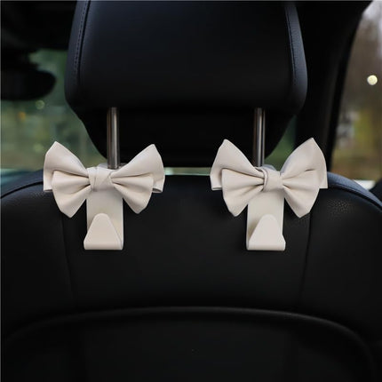 2 Pack Car Purse Hooks, Cute Bow Car Seat Headrest Hook Hanger for Purses and Bags, Space-Saving Car Accessory (Cream white).