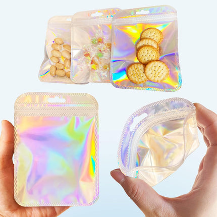 100 Pcs Holographic Resealable Packaging Bags for Small Business Supplies, Cute Small Color Smell Proof Bags Plastic Baggies for Lip Gloss Soap Party Food Storage 4x6inch.