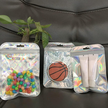100 Pcs Holographic Resealable Packaging Bags for Small Business Supplies, Cute Small Color Smell Proof Bags Plastic Baggies for Lip Gloss Soap Party Food Storage 4x6inch.