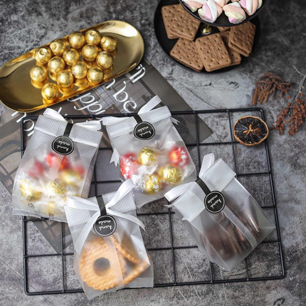100 Pack Translucent Plastic Bags for Cookie,Cake,Chocolate,Candy,Snack Wrapping Good for Bakery Party with Stickers.