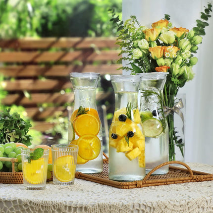 Set of 4 Glass Carafe with Lid, 1 Liter Beverage Serveware Carafe, Clear Pitcher for Mimosa Bar, Brunch, Cold Water, Juice, Milk, Iced Tea, Lemonade -.