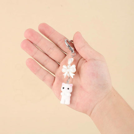 Cute Fuzzy Cat Keychain, Charm Keychain Lover Gift Heart Bow Pendent Stuffed Animal for Women Backpack Purse Bag Phone Decorative Ornament Accessories White -.