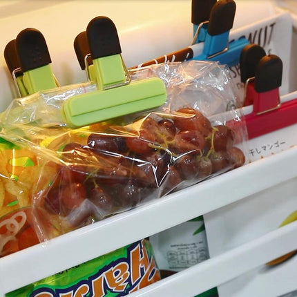 Set of 9 food clips - sturdy, airtight, reusable in 3 colours to keep food fresh - perfect for home, the kitchen, travelling and camping.