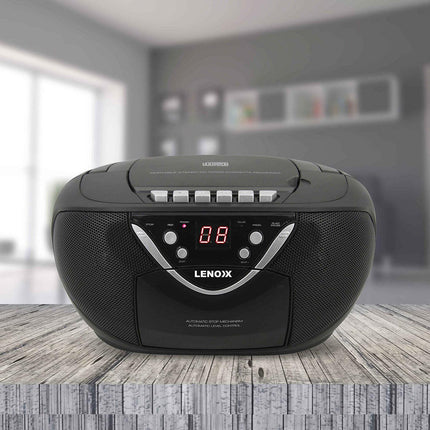 Portable CD/Cassette Player with AM/FM Radio Speaker.