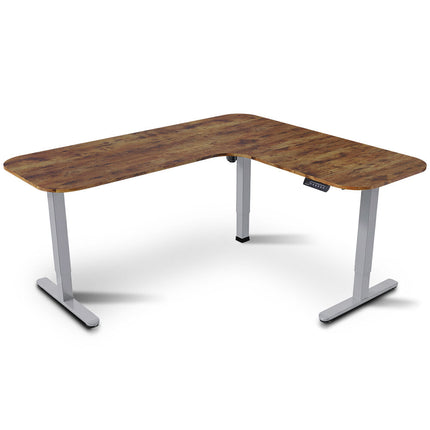 FORTIA Corner Standing Desk, 160x140cm, 72-118cm Sit to Stand Up Electric Height Adjustable, Walnut Style Desktop/Silver Frame.