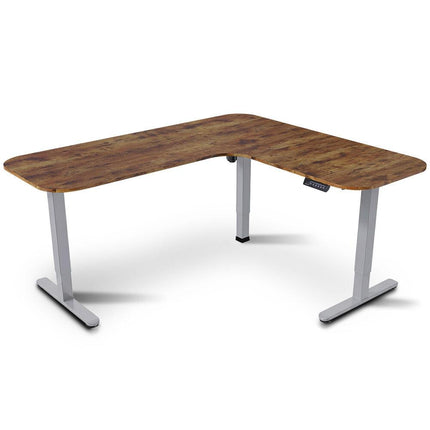 FORTIA Corner Standing Desk, 160x140cm, 72-118cm Sit to Stand Up Electric Height Adjustable, Walnut Style Desktop/Silver Frame.