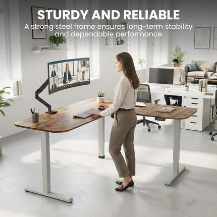 FORTIA Corner Standing Desk, 160x140cm, 72-118cm Sit to Stand Up Electric Height Adjustable, Walnut Style Desktop/Silver Frame.