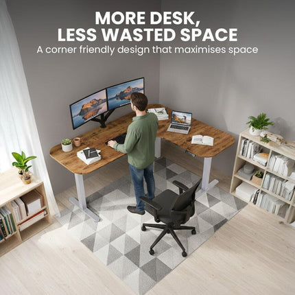 FORTIA Corner Standing Desk, 160x140cm, 72-118cm Sit to Stand Up Electric Height Adjustable, Walnut Style Desktop/Silver Frame.