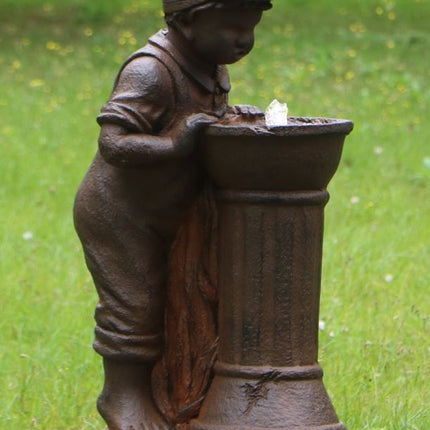 Boy at Water Fountain.