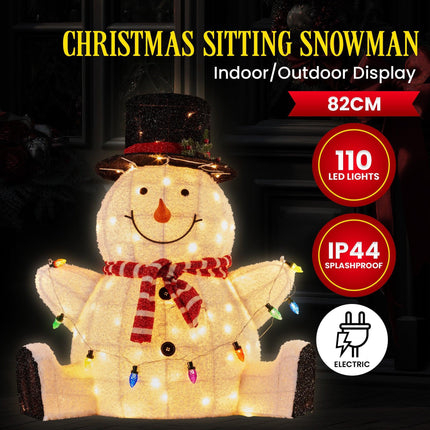 Christabelle 82cm Sitting Snowman Christmas Display with Lights.