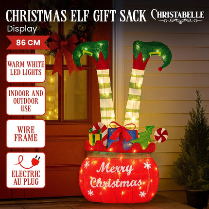 Christabelle Elf in Gift Sack Christmas Display Warm White LED Lights 86cm for Decoration w/Wire Frame Construction.