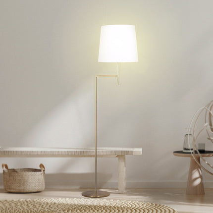 Sarantino Metal Floor Lamp in Antique Brass Finish with Cream Linen Fabric Shade.