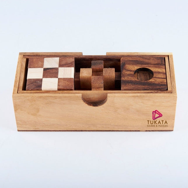 3 individual brainteaser wooden puzzles in a gift wooden box.