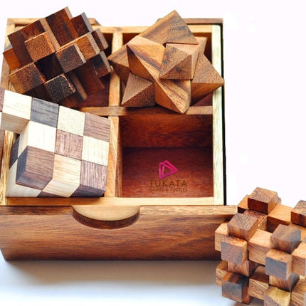 4 individual brainteaser wooden puzzles in a gift wooden box.