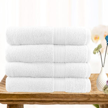 4 piece ultra light cotton bath towels in white.