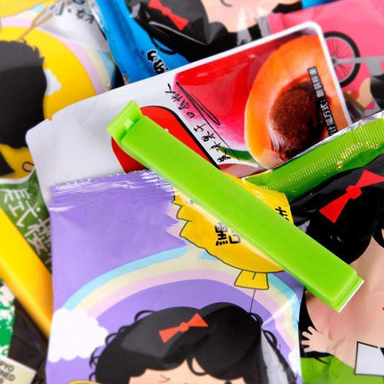 Plastic Sealing Bag Clip Sealer Clamp Kitchen Storage Food Snack Chips Seal Tool - 12PCS.
