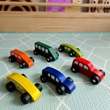 Coloured wooden cars.