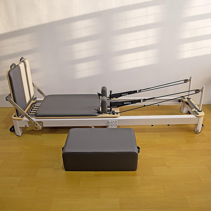 Folding Pilates Reformer Machine – Home Workout Bed for Full Body Fitness Training.