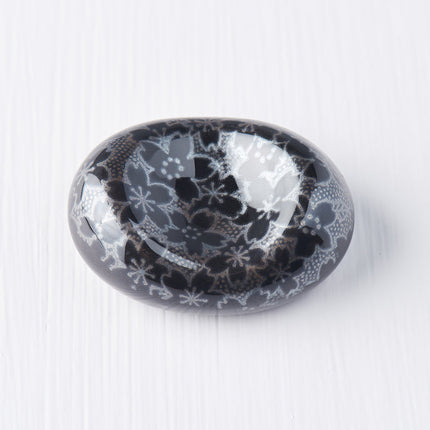 Chopstick Rest Pebble Black Sakura Design.
