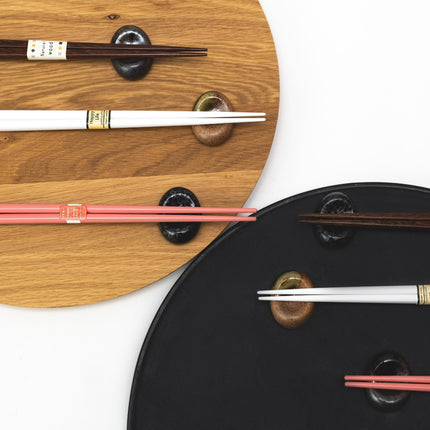 Chopstick Rest Pebble Black Sakura Design.