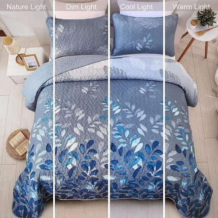 Blue Garden Coverlet Set with Quilted Floral Pattern and Pillowcases.