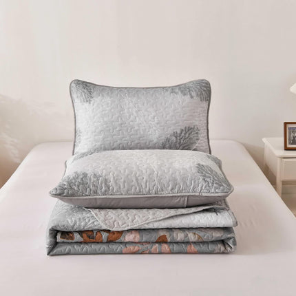 Brown Verdant Quilted Ensemble with Flower Motifs bedspread  and Pillowcases.