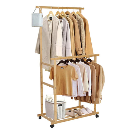 Portable Rolling Bamboo Clothes Rack for Kids with Hanging Rail.
