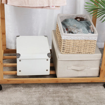 Portable Rolling Bamboo Clothes Rack for Kids with Hanging Rail.