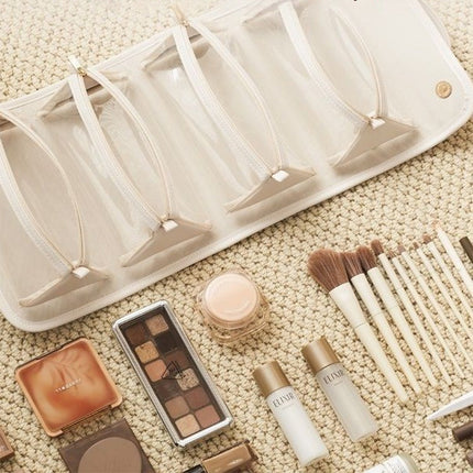 White Roll-Up Travel Makeup Bag - Compact Cosmetic Organizer with Multiple Compartments.