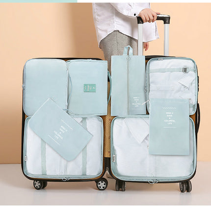 Navy Blue Travel Packing Cube Set - 7-Piece Luggage Organizer for Clothes, Toiletries, and Accessories.